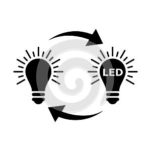 Light bulbs. Replacing an old light bulb with an energy-saving light bulb icon isolated on white background