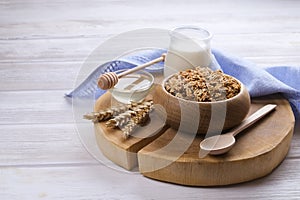 Light carbohydrate and protein rich granola yougurt all-day energy breakfast. Mixed nuts and oats vegeterian super food.