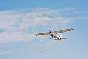 Light cessna plane flies