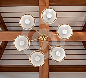 a light chandelier ceiling under roof