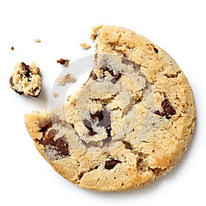 Light chocolate chip cookie, bite missing with crumbs from above