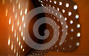 Light circles on leather abstract background