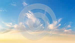 Light cirrus clouds in the blue sky during dawn sunset