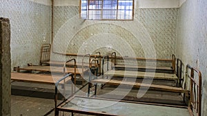 Light Coming in Through Prison Cell Bars Window. Empty Jail Cells. Prison Interior.