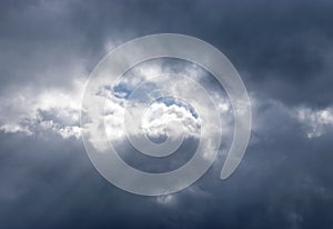 Light in the Dark and Dramatic Storm Clouds