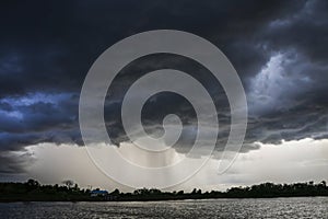 Light in the Dark and Dramatic Storm Clouds background