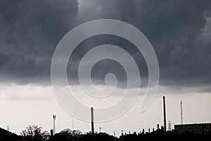 Light in the Dark and Dramatic Storm Clouds. dark storm clouds before rain. Background image in a dark gray style. Mountain