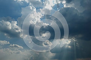 Light in the Dark and Dramatic Storm Clouds