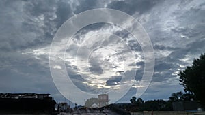 Light in the dark and dramatic storm clouds