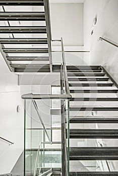 Light design stairs made of stainless steel, tempered glass, steel