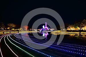 Light display and pond reflection in Nabana no Sato in Japan