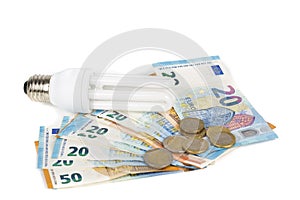 Light economic Bulb on european banknotes