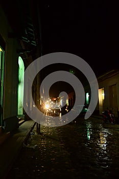 Light at the end of a dark street. Trinidad, Cuba