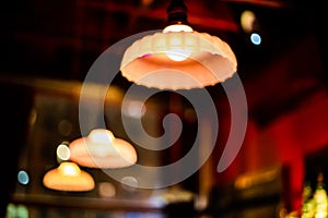 Light Fixtures at Bar Hangout with red and orange accent colors