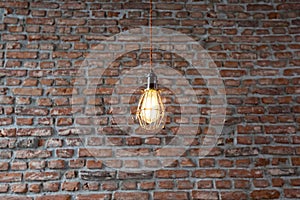 Light fixtures on a wall with bricks background.