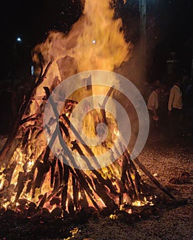 Light flames indian celebrate holi holika dahan barning wood