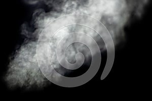 Light flow of steam on a black background