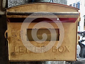 A light golden Letter Box