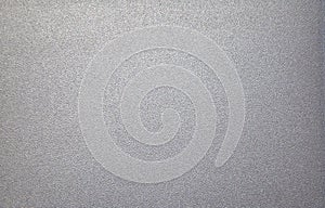 Light gray rough metallic surface. Background. Texture. Close-up