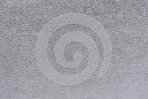 Light gray rough painted concrete wall texture