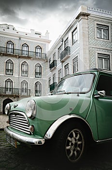 Light green classic british Austin Mini car in Lisbon, Portugal