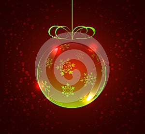 Light green glass ball with snowflakes on a red background