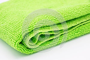 Light green microfiber cloth on white background