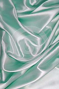 Light green Silk cloth of wavy abstract background