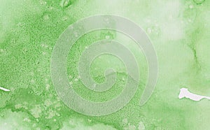 Light green spring shades abstract watercolor painted paper textured effect background. Aquarelle illustration for grunge design