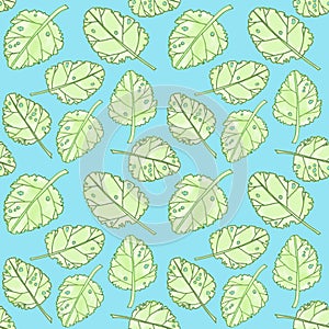 Light green spring watercolor graphic leaves seamless pattern on blue background