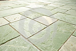 Light green stone tile floor background