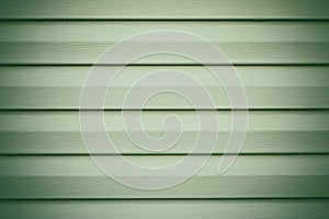Light green wooden background in lines. Striped texture. Planks timber backdrop. Gray panel, wood surface. Grey painted boards. Oa