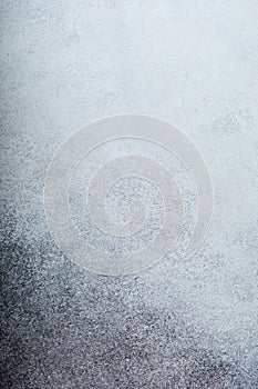 Light grey stone or slate wall.Grunge background.