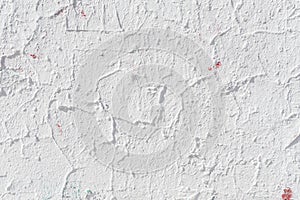 Light grunge cracked painted concrete wall, abstract background texture