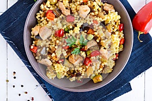 Light healthy dietary salad with couscous, vegetables