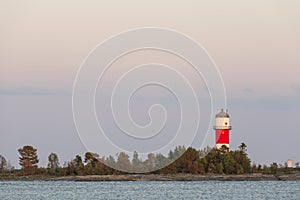 Light House with trees and Ocean