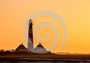 Light House Westerhever at afternoon,against a sunset