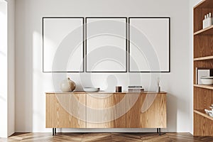 Light living room interior dresser and shelf with art decoration, mockup frames