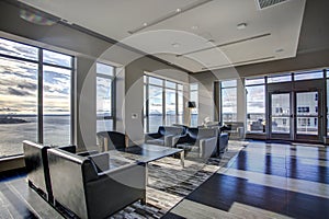 Light lounge area with view of Elliott Bay waters.