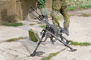 A light machine gun on bipod with telescopic sights