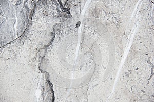 Light natural stone with streaks. Marble texture. Gentle warm cream. Stone background