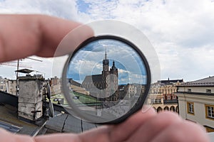 Light or optical filter with view of Church Bazylika Mariacka or towers of st.Mary`s. Top view from roof or balcony to old Krakow