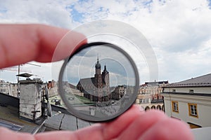 Light or optical filter with view of Church Bazylika Mariacka or towers of st.Mary`s. Top view from roof or balcony to old Krakow photo