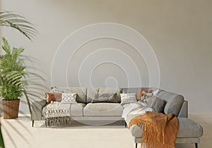 The light from the outside hit the wall of the room and the sofa located inside. give a warm atmosphere.3d rendering