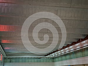 Light from the outside penetrates into the building, illuminating the space of the airport in an interesting way. Abstract.