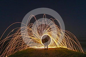 Light Painting with fire circles and two lovers
