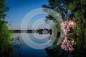 Light painting beside a lake