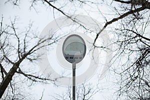 Light in park. LED lamp on pole