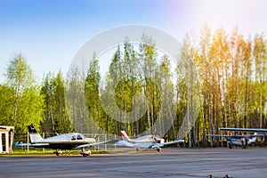 Light passenger planes before departure in airport