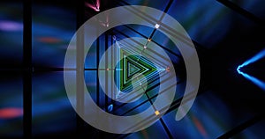 Light patterns create a vibrant triangle in dark space